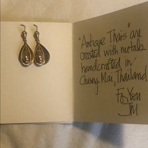Earrings brand new on card